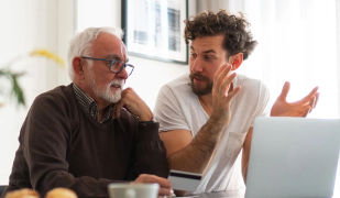 A father and his son talking to each other